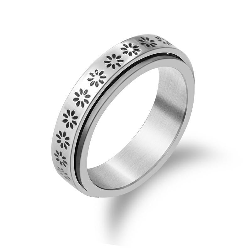 Anillo giratorio de flor
