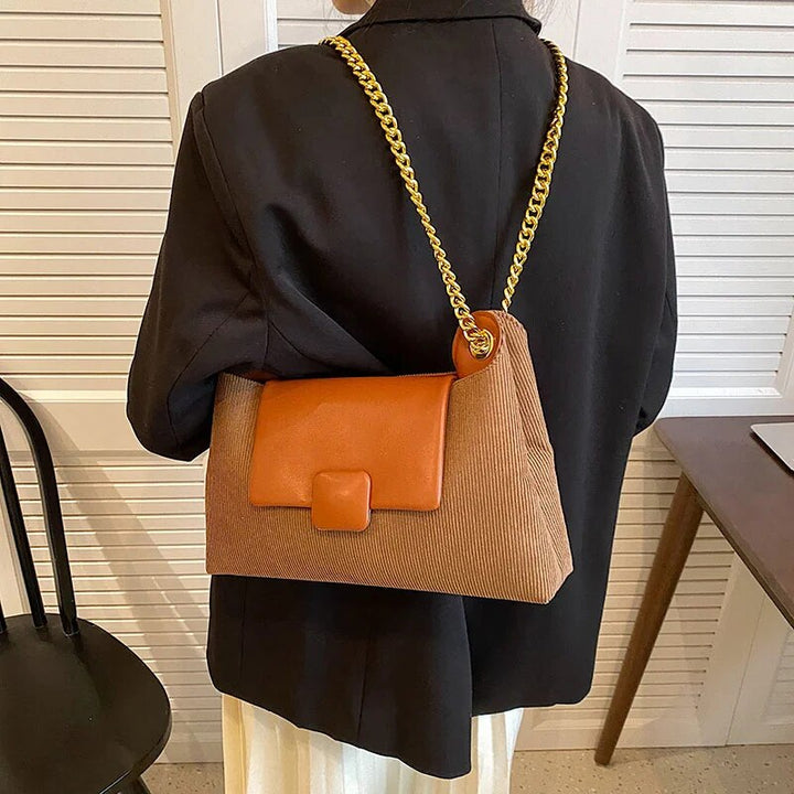 Bolso cruzado de pana con cadena