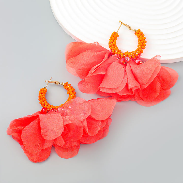 Pendientes de aro con cuentas y flores