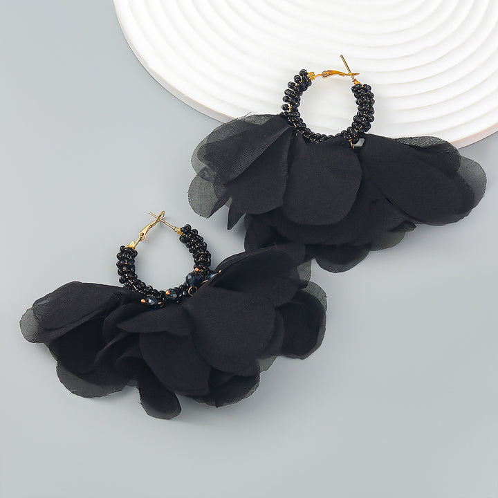 Pendientes de aro con cuentas y flores