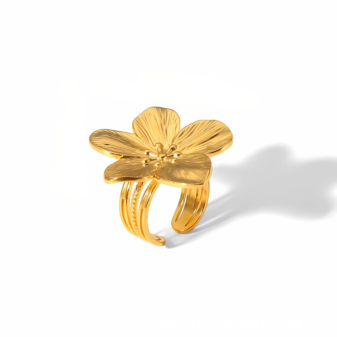 Anillo de flor dorada con pistilo