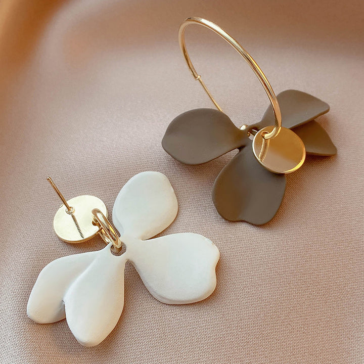 Pendientes asimétricos