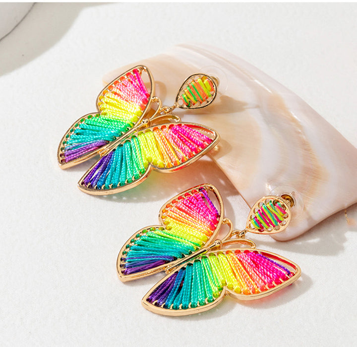 Aretes de mariposa de hilo colorido