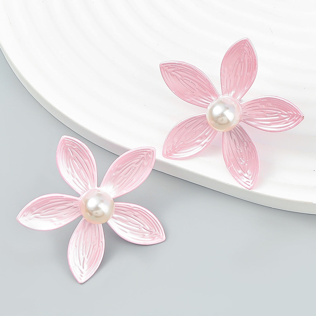 Pendientes de flor de metal con perla